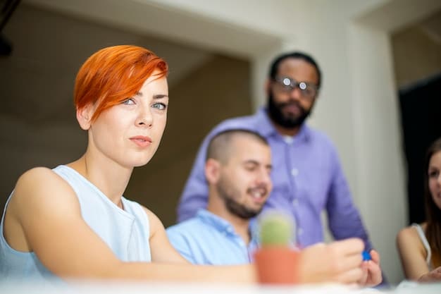 A group of employees participating in a leadership training session, with a focus on team-building activities. They are engaged in a hands-on exercise, working together to solve a problem. The scene should convey a sense of collaboration and active learning.