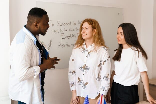 Three colleagues in a bright office engaging in a dynamic discussion, with one asking a question pointing to a whiteboard covered in notes. The atmosphere is collaborative and intense.