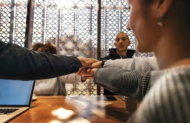 Two individuals from different cultural backgrounds shaking hands in a business setting, with their respective national flags subtly displayed in the background, representing a successful cross-cultural agreement.