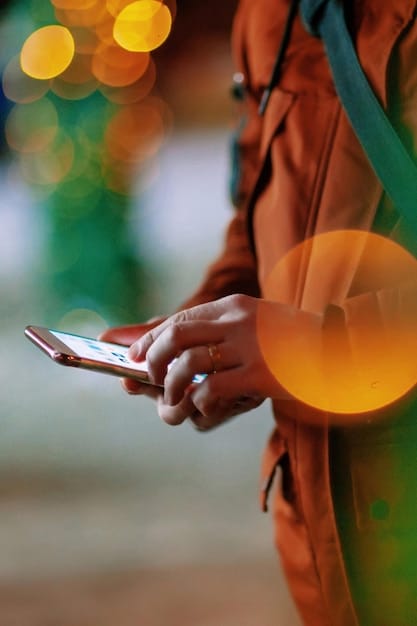 A person using a time tracking app on their smartphone with different categories and times logged. The focus is on the screen displaying organized data.