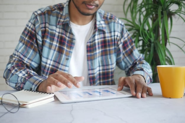 A person reviewing charts and graphs on a tablet, with a focused expression, analyzing time usage patterns.