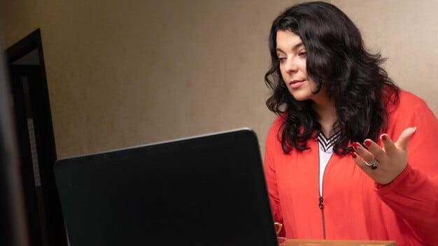 A person using a laptop to research attendees and speakers before attending a professional conference, highlighting their profiles on LinkedIn.