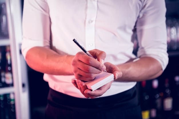 A person holding a notepad and pen, actively taking notes during a networking event. Their focus is entirely on the speaker, and they maintain eye contact while jotting down key points. The background shows other attendees engaged in discussions, portraying an active and attentive environment.