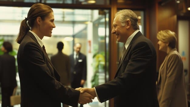 A close-up shot of a person confidently shaking hands with another professional at a business conference, symbolizing a successful networking interaction.